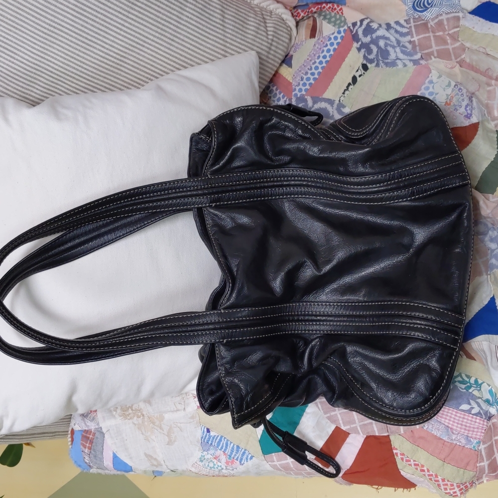 DKNY black soft leather handbag with drawstring & snap closure